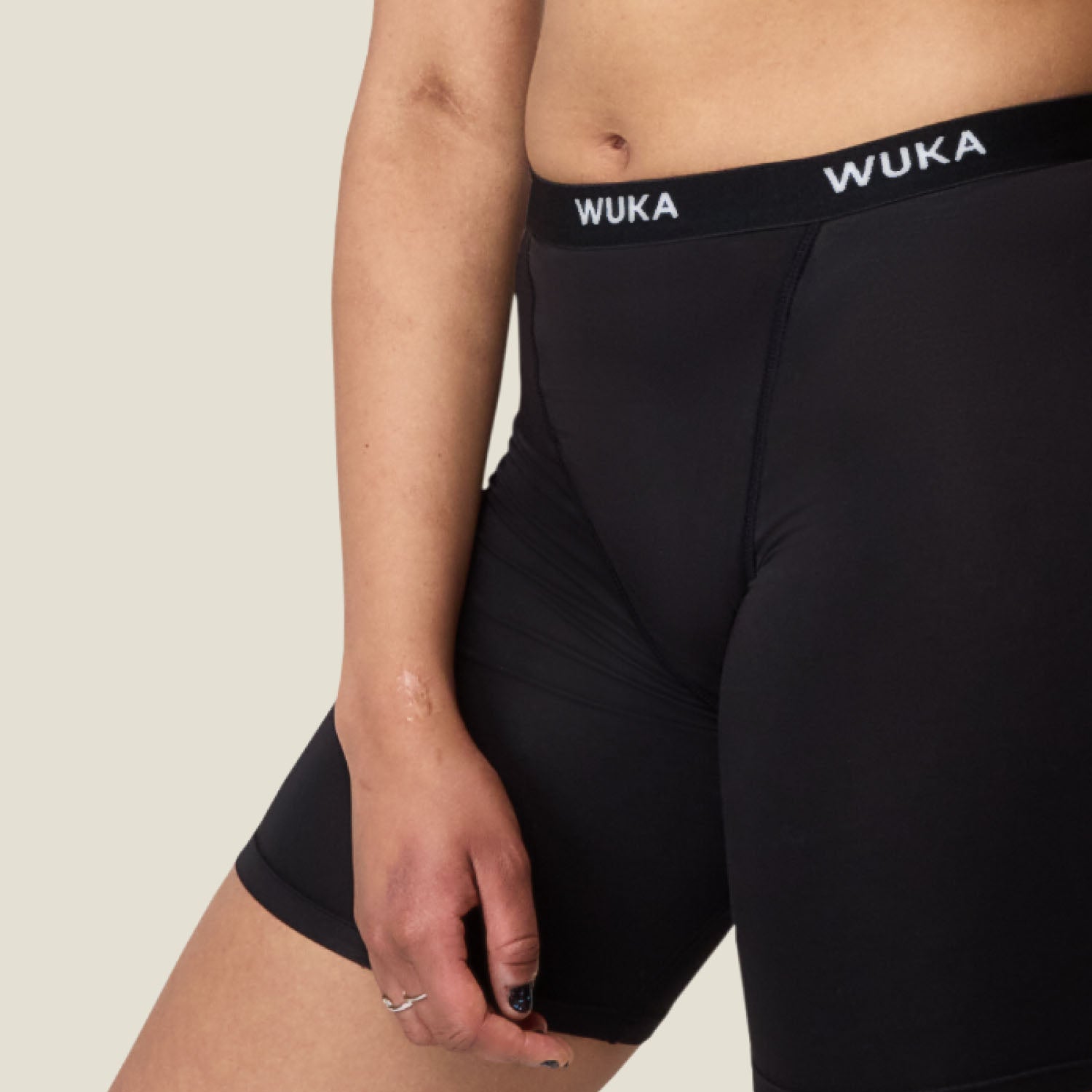 Close-up of the waistband and stitch detailing on WUKA Ultimate™ Boxer Shorts, featuring soft, breathable fabric ideal for heavy flow.