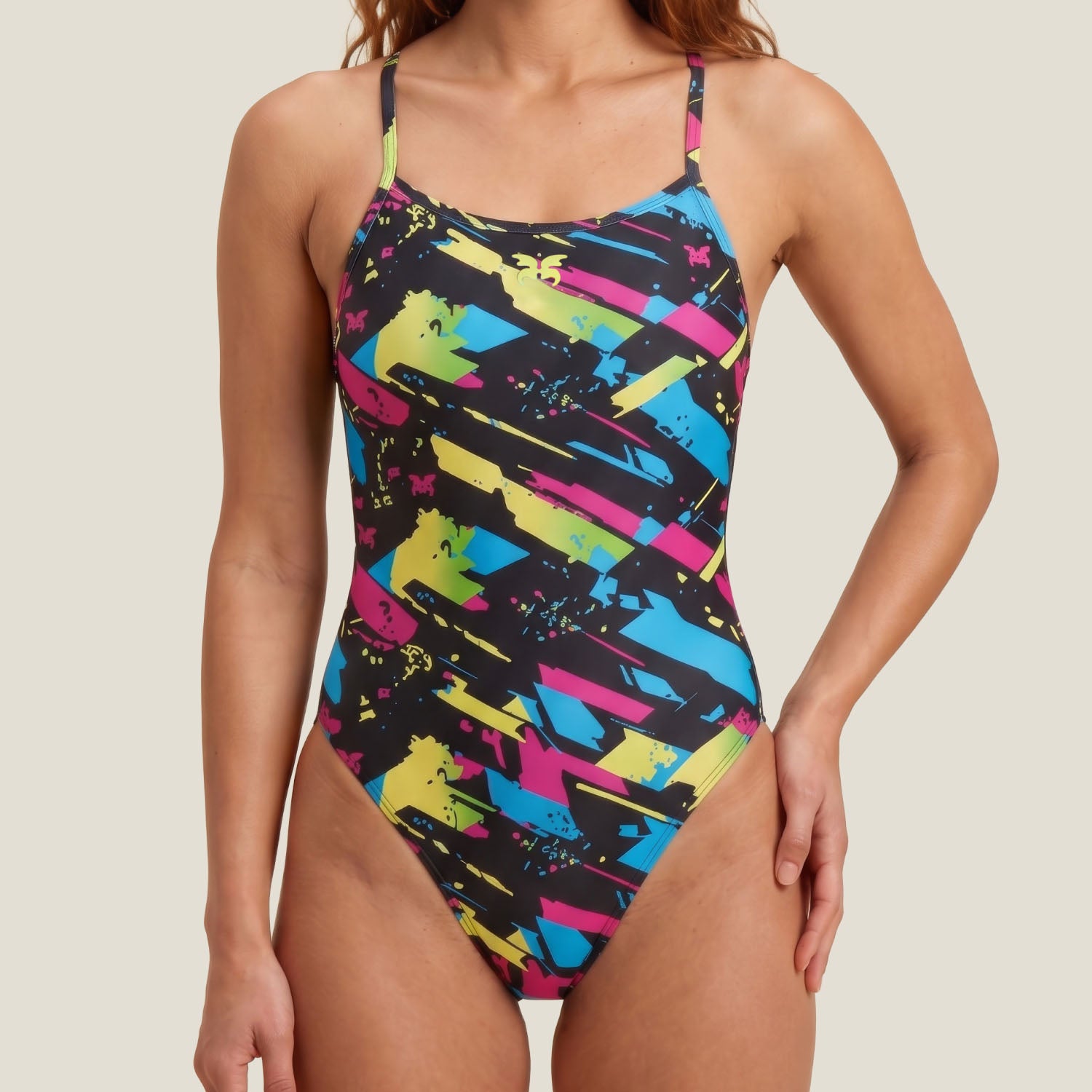 Side view of the WUKA Lunafly Competition Tie-Back period swimsuit on a teen swimmer — heavy flow swimwear