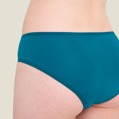 Close-up of WUKA Teen Swim Bikini Brief in blue, showing detailed stitching, smooth fabric texture, and quality construction.