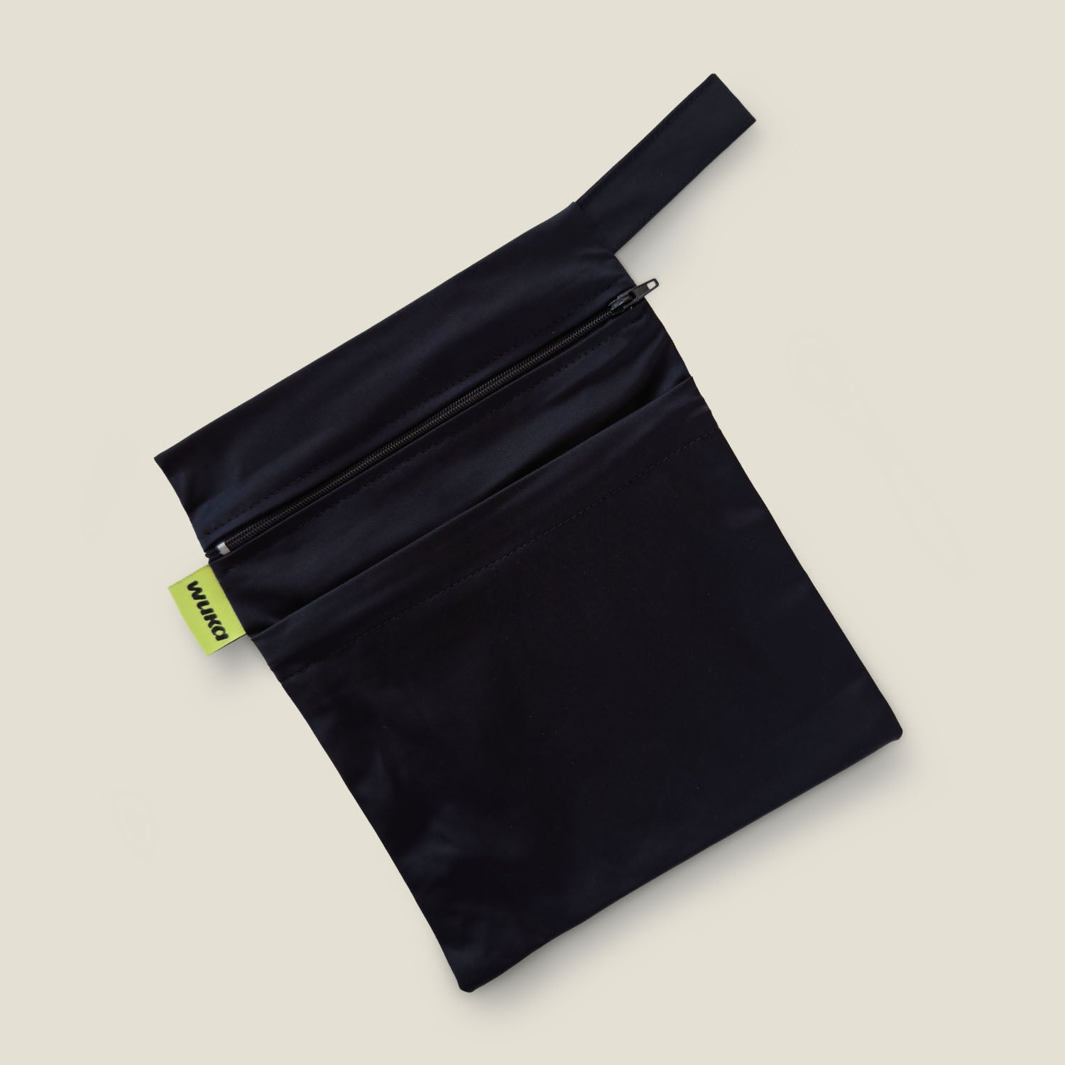 Black waterproof wet bag with zip for storing used swimwear and period swim shorts after swimming